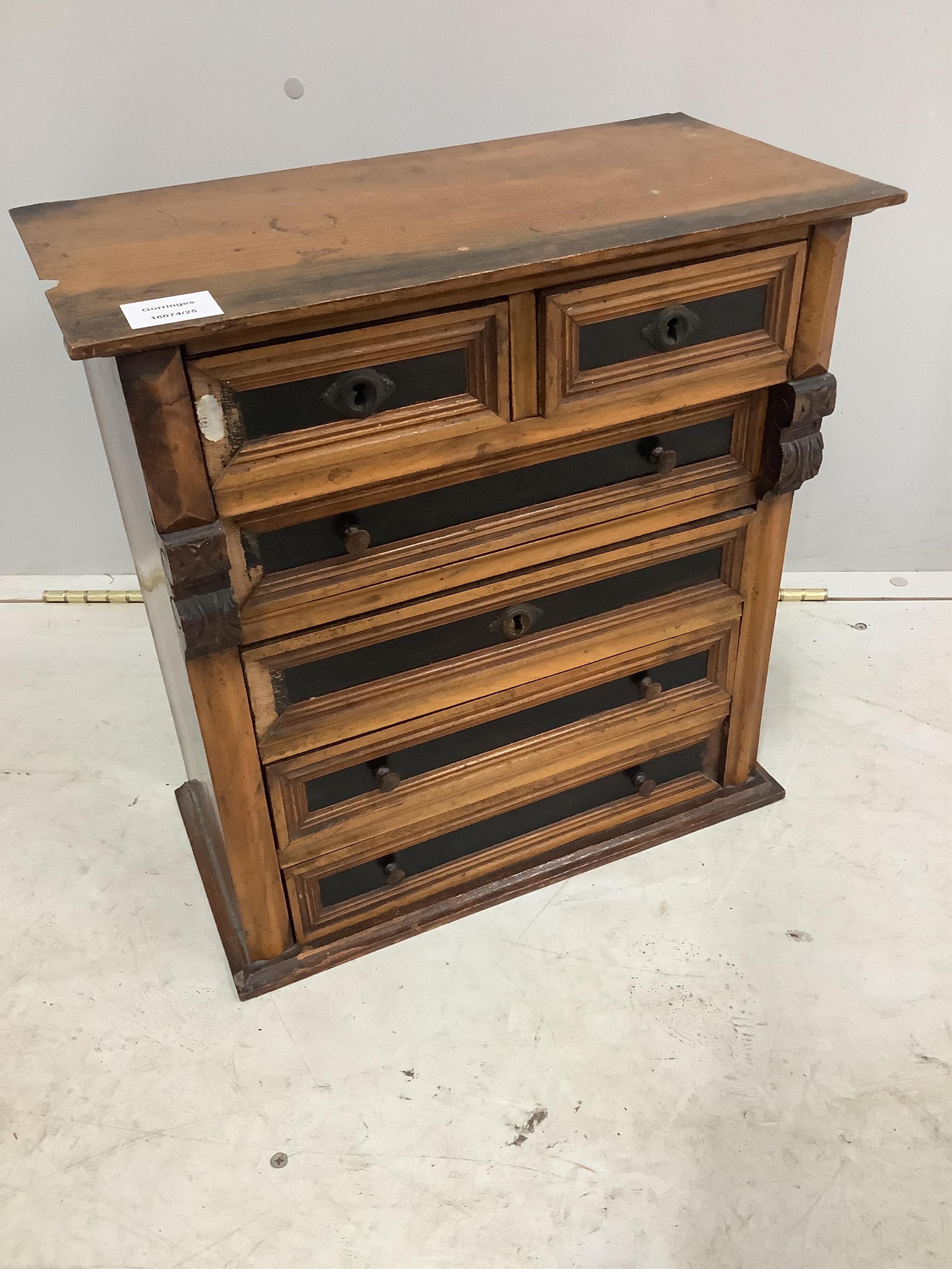 A 19th century Continental miniature chest of six drawers, width 45cm, height 46cm. Condition - a few sections of moulding loose but present, otherwise fair